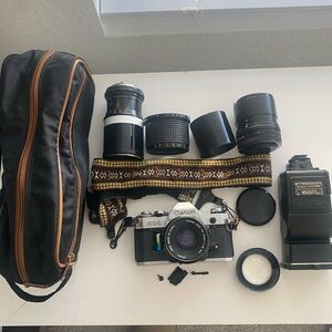 Canon AE-1 Camera with Lenses - Black and Silver